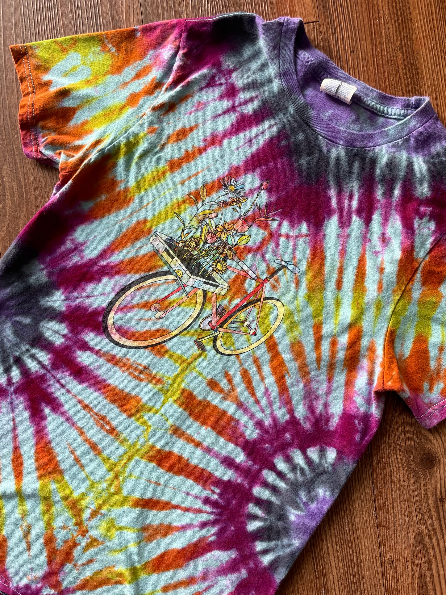 Small Women’s Floral Bicycle Handmade Reverse Tie Dye T-Shirt | Blue, Pink, and Orange Pleated Tie Dye Short Sleeve