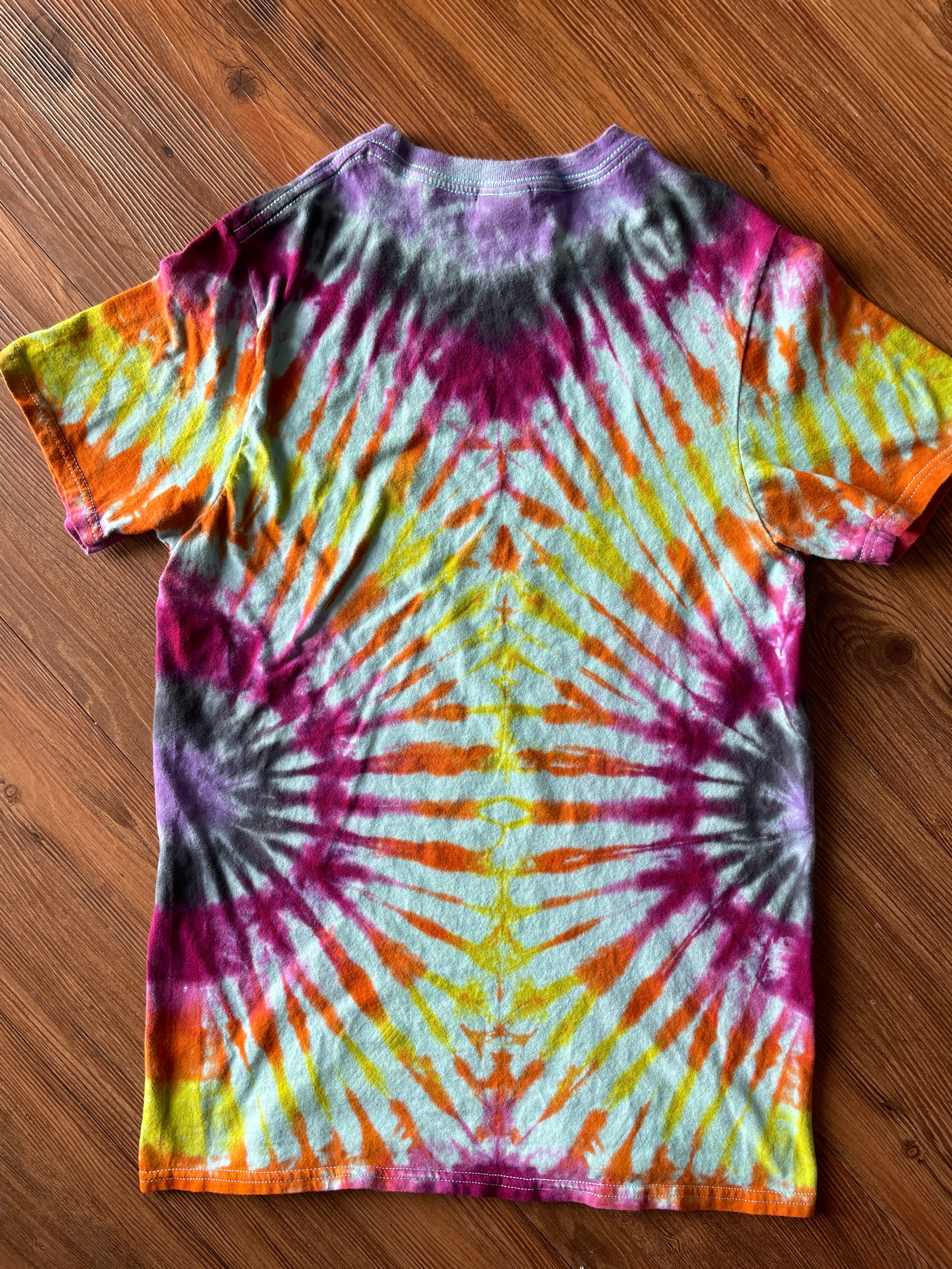 Small Women’s Floral Bicycle Handmade Reverse Tie Dye T-Shirt | Blue, Pink, and Orange Pleated Tie Dye Short Sleeve