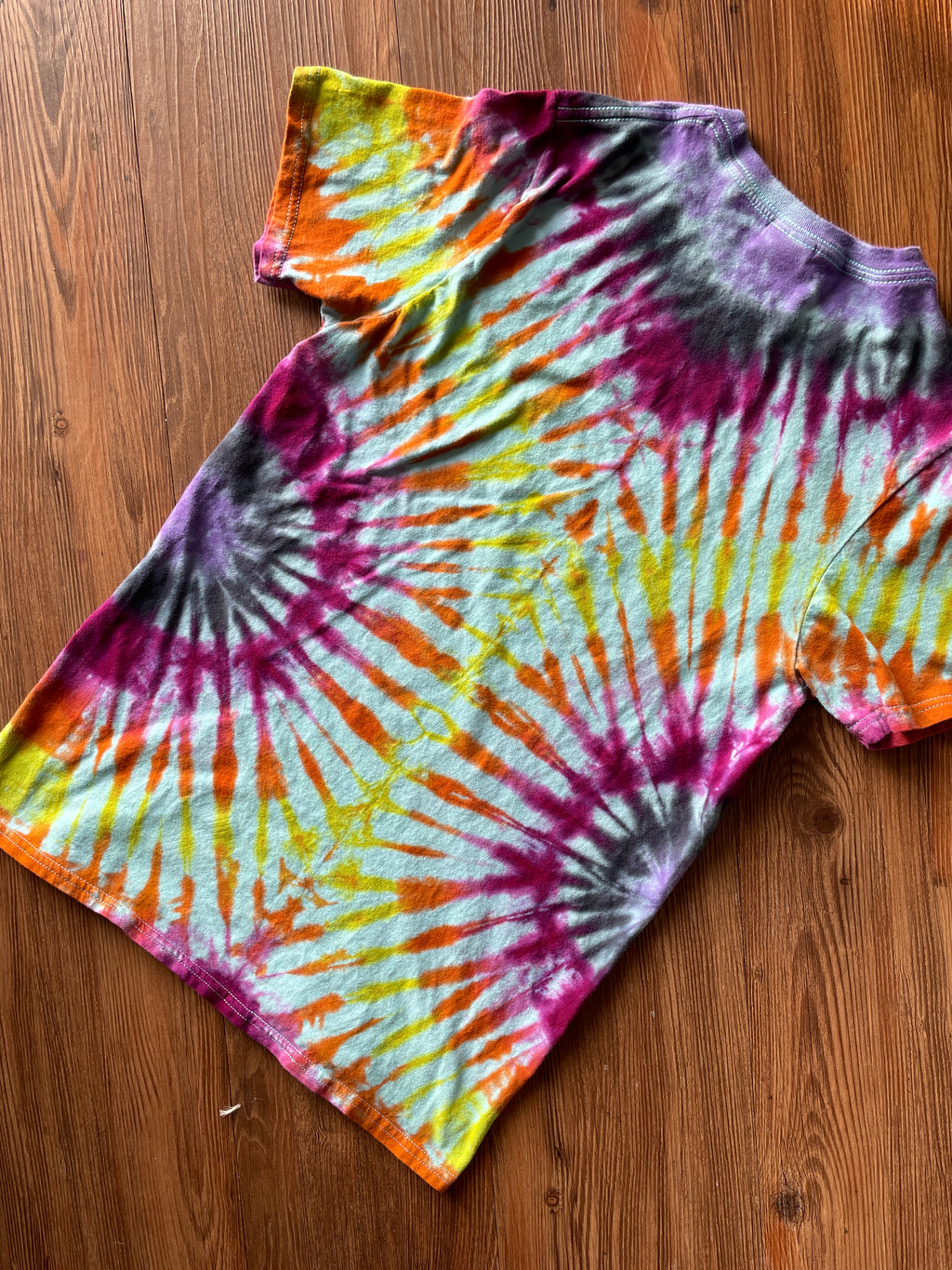 Small Women’s Floral Bicycle Handmade Reverse Tie Dye T-Shirt | Blue, Pink, and Orange Pleated Tie Dye Short Sleeve