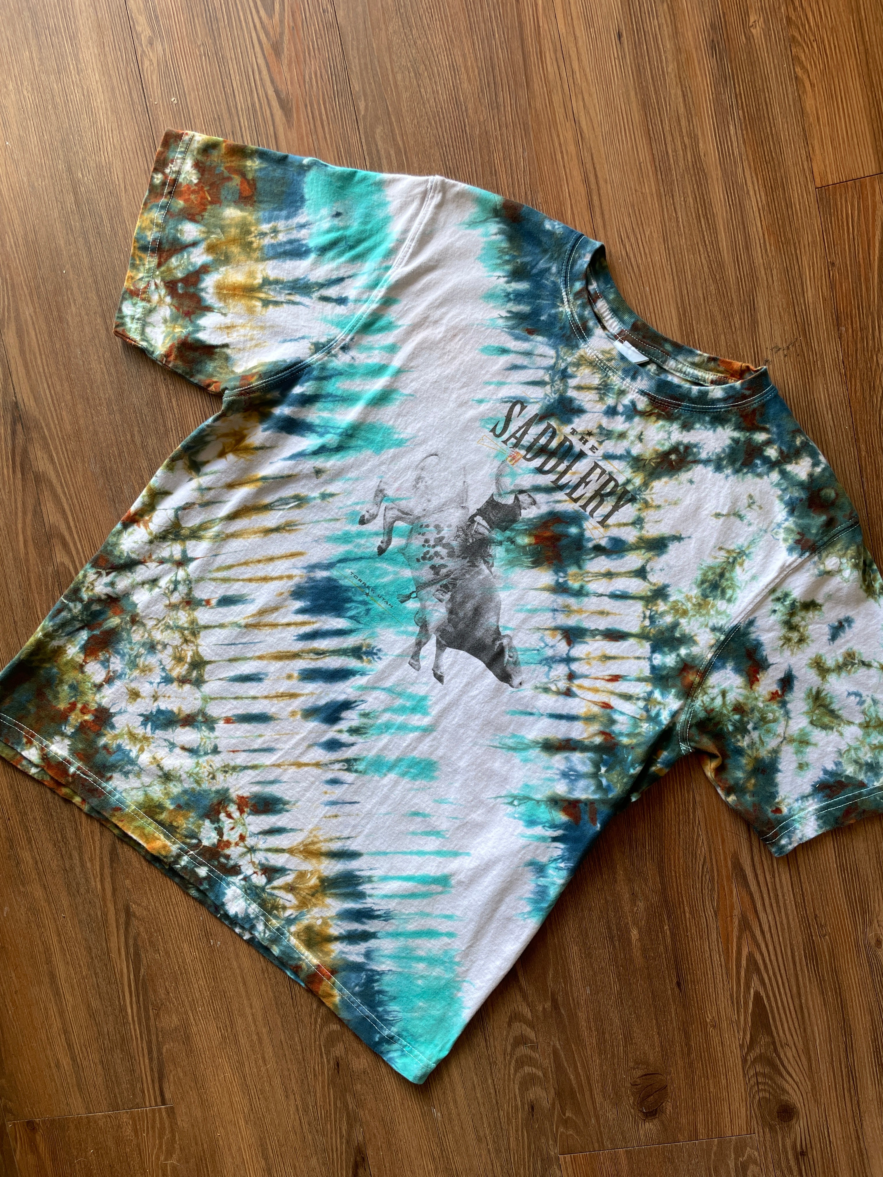 LARGE Men’s The Saddlery Bullrider Handmade Tie Dye T-Shirt | One-Of-a-Kind White, Blue, Green, and Brown Short Sleeve