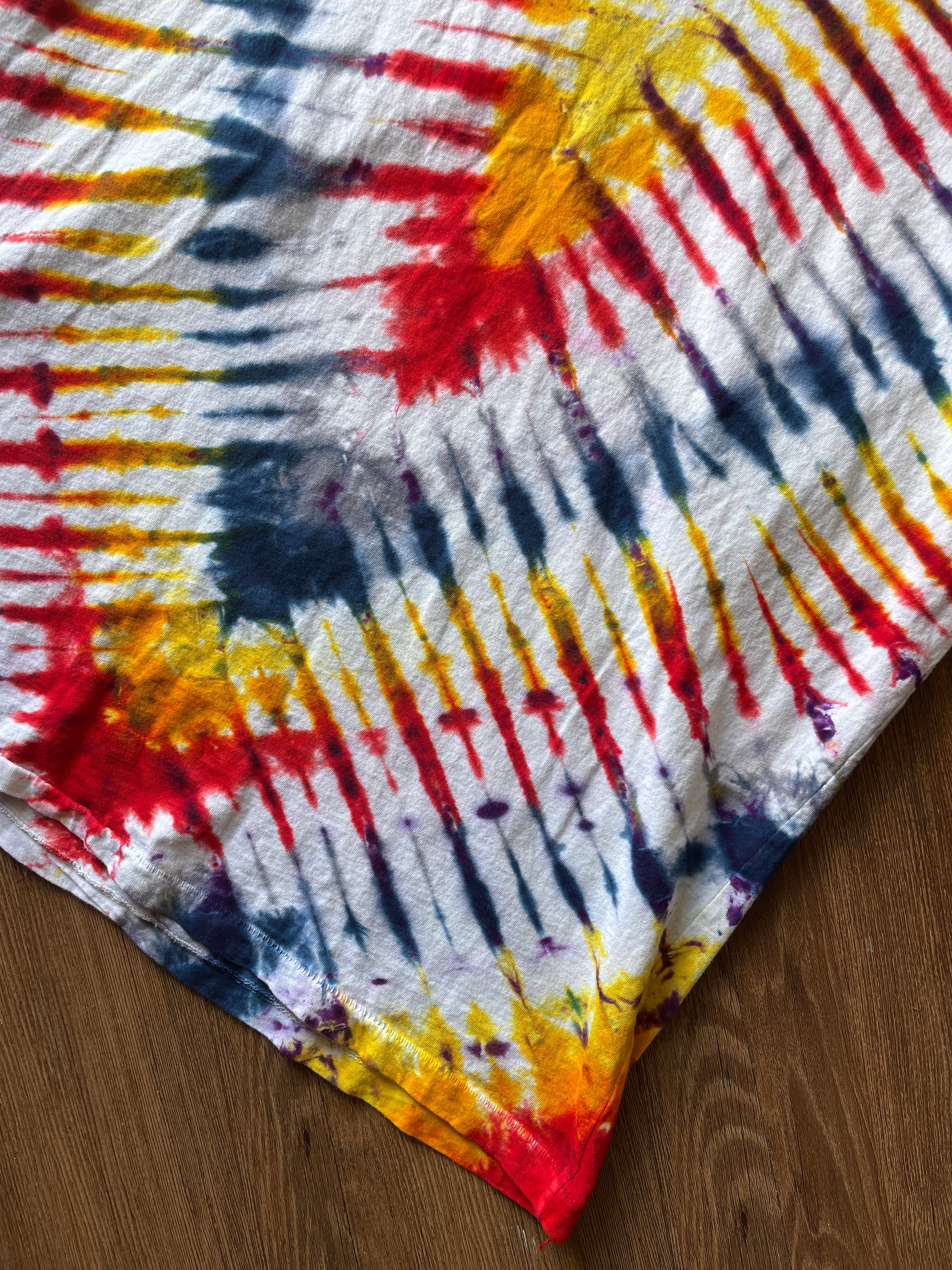 Small Men’s Local Boogeyman STALKER Handmade Tie Dye T-Shirt | Red, Orange, Yellow, and Black Pleated Tie Dye Short Sleeve