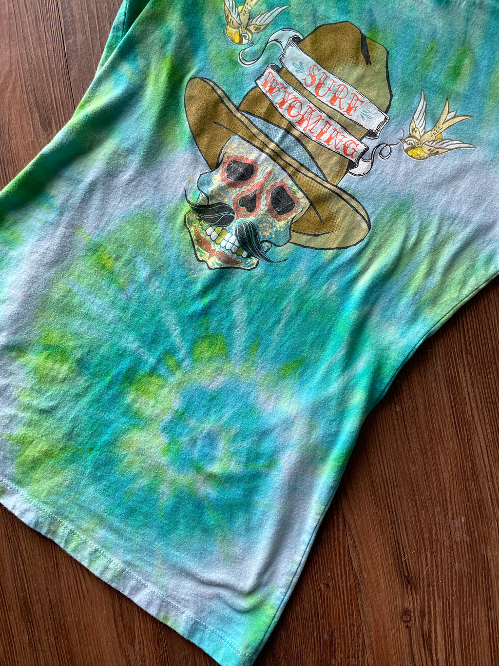 LARGE Women’s Surf Wyoming Dias de Los Muertos Sundance Kid Sugar Skull Handmade Tie Dye T-Shirt | One-Of-a-Kind Pastel Green and Blue Spiral Short Sleeve