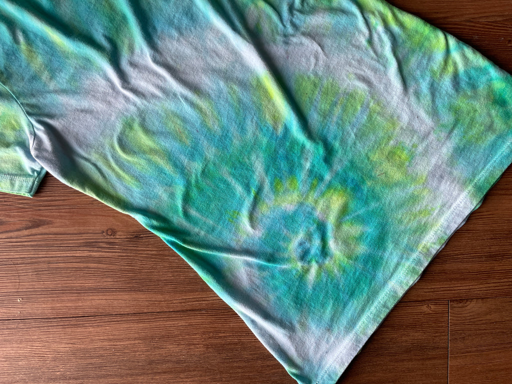 LARGE Women’s Surf Wyoming Dias de Los Muertos Sundance Kid Sugar Skull Handmade Tie Dye T-Shirt | One-Of-a-Kind Pastel Green and Blue Spiral Short Sleeve