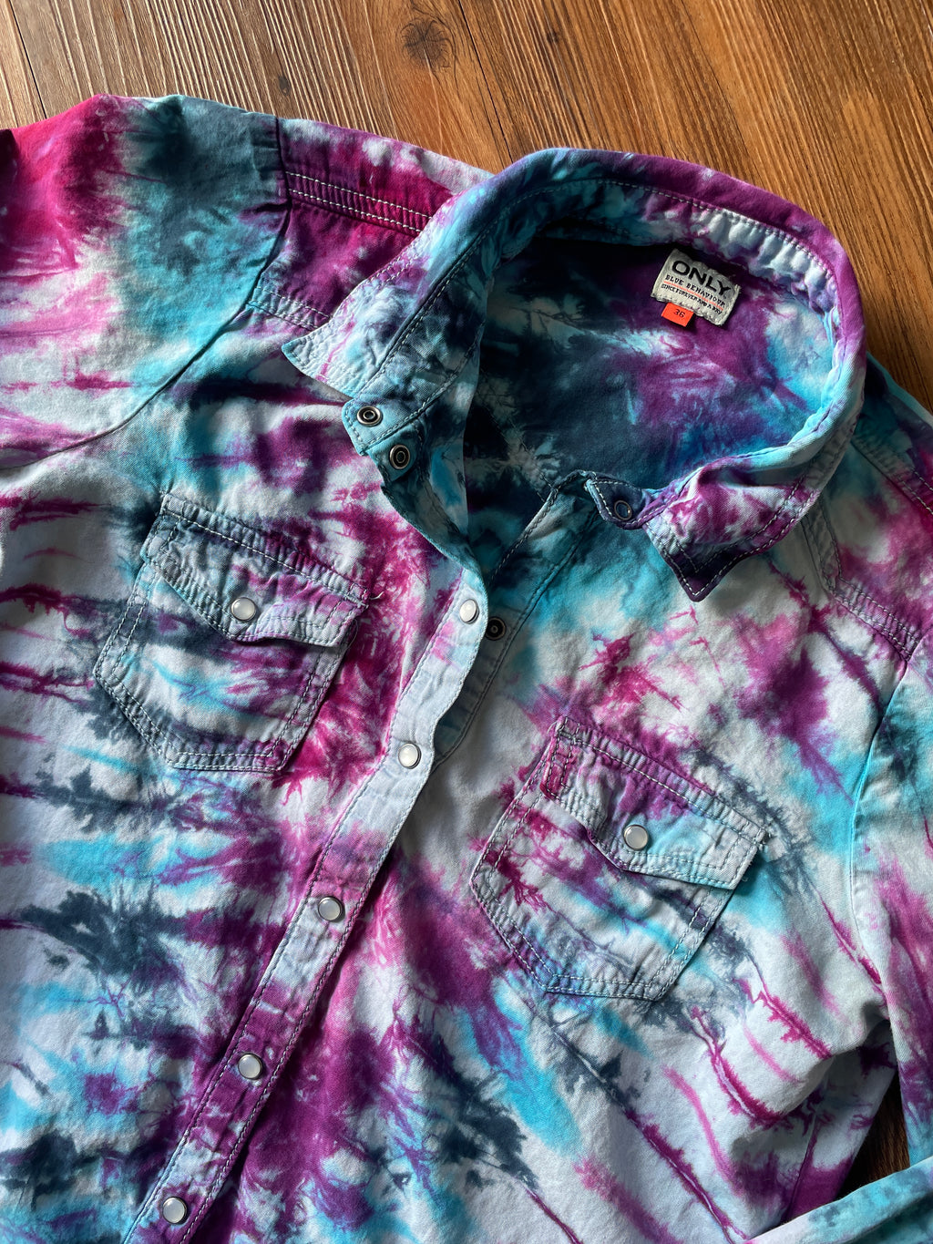MEDIUM Women’s Handmade Tie Dye Chambray Pearl Snap Shirt | One-Of-a-Kind Blue, Purple, and Pink Pleated Long Sleeve