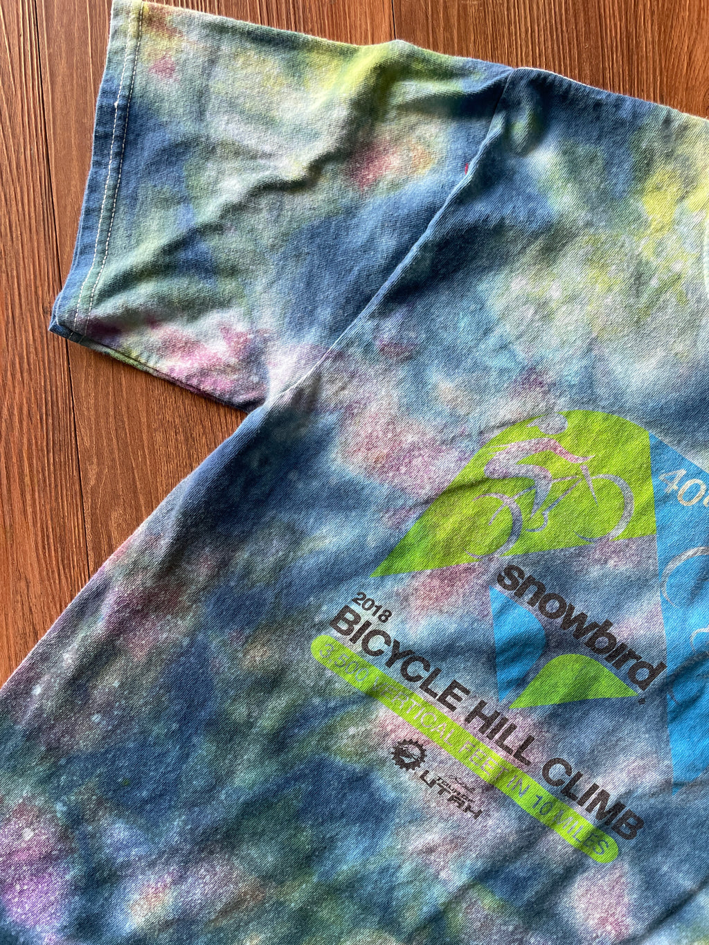 Small Men’s 2018 40th Annual Snowbird Bicycle Hill Climb Galaxy Handmade Tie Dye T-Shirt | One-Of-a-Kind Pastel Blue and Green Short Sleeve