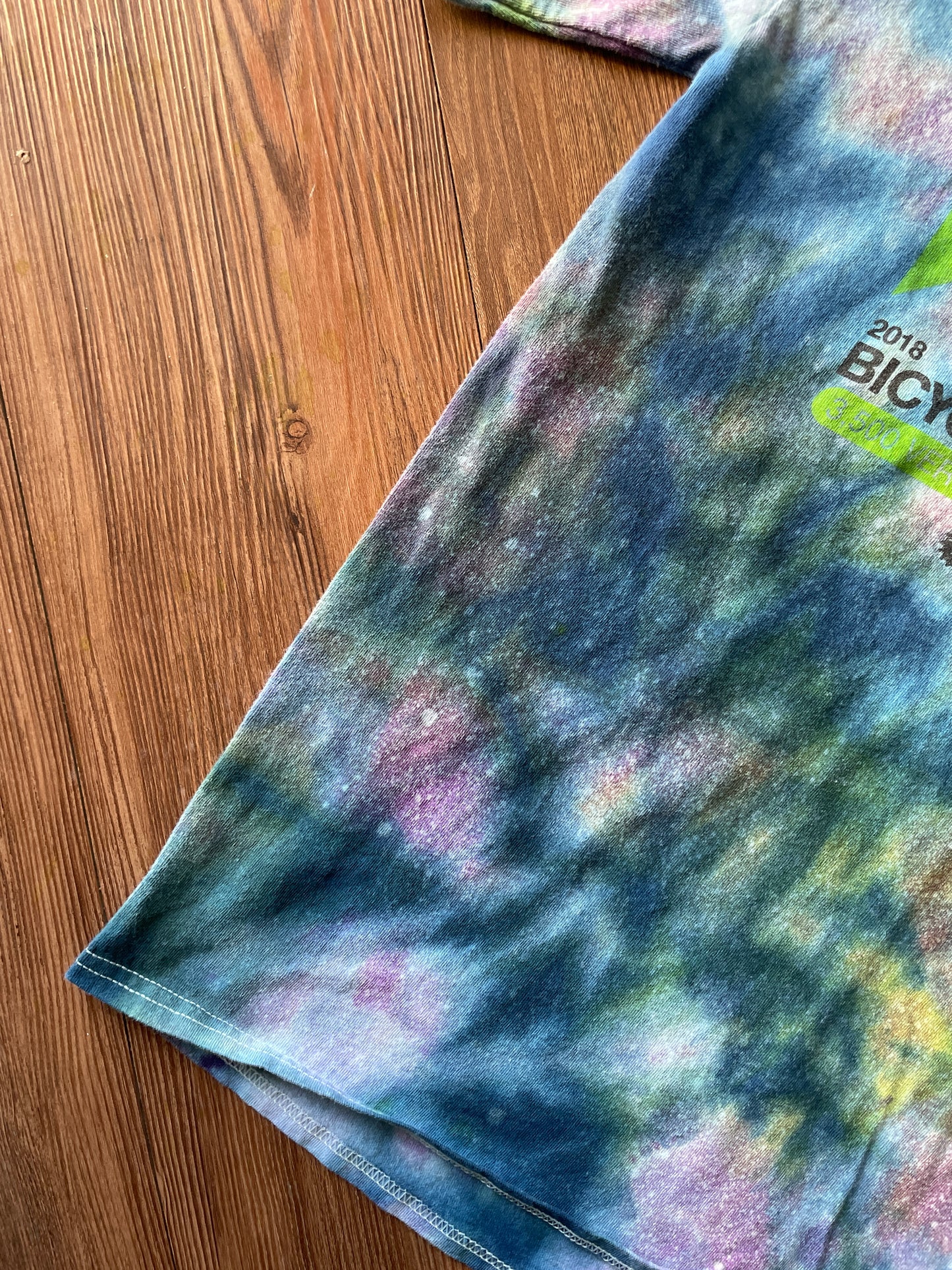 Small Men’s 2018 40th Annual Snowbird Bicycle Hill Climb Galaxy Handmade Tie Dye T-Shirt | One-Of-a-Kind Pastel Blue and Green Short Sleeve