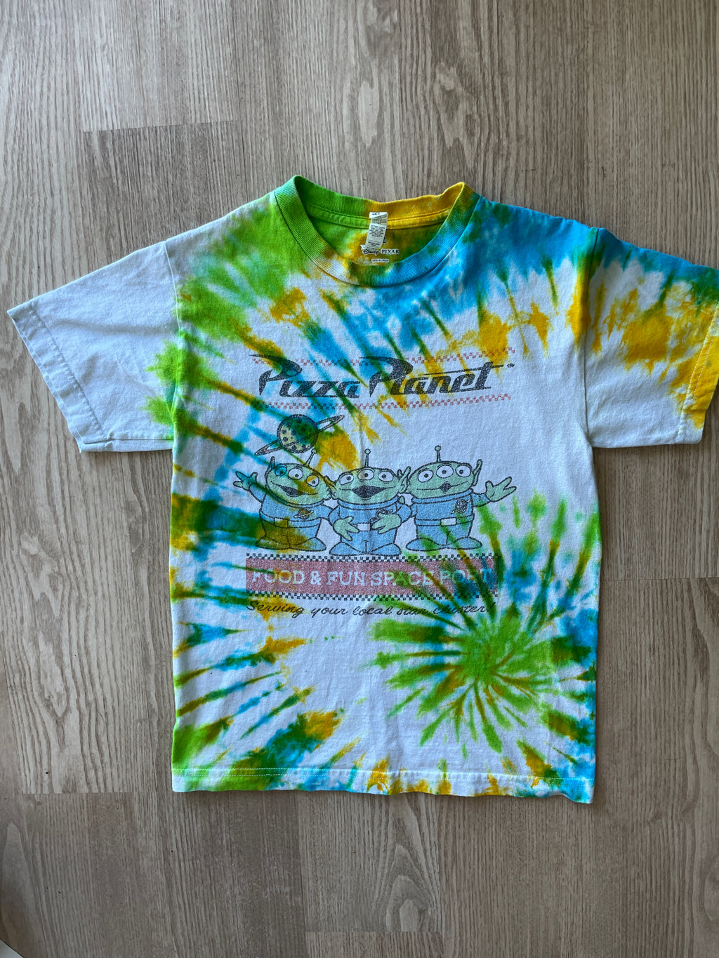SMALL Men’s Toy Story Pizza Planet Handmade Tie Dye T-Shirt | One-Of-a-Kind Green, Blue, and Yellow Spiral Short Sleeve