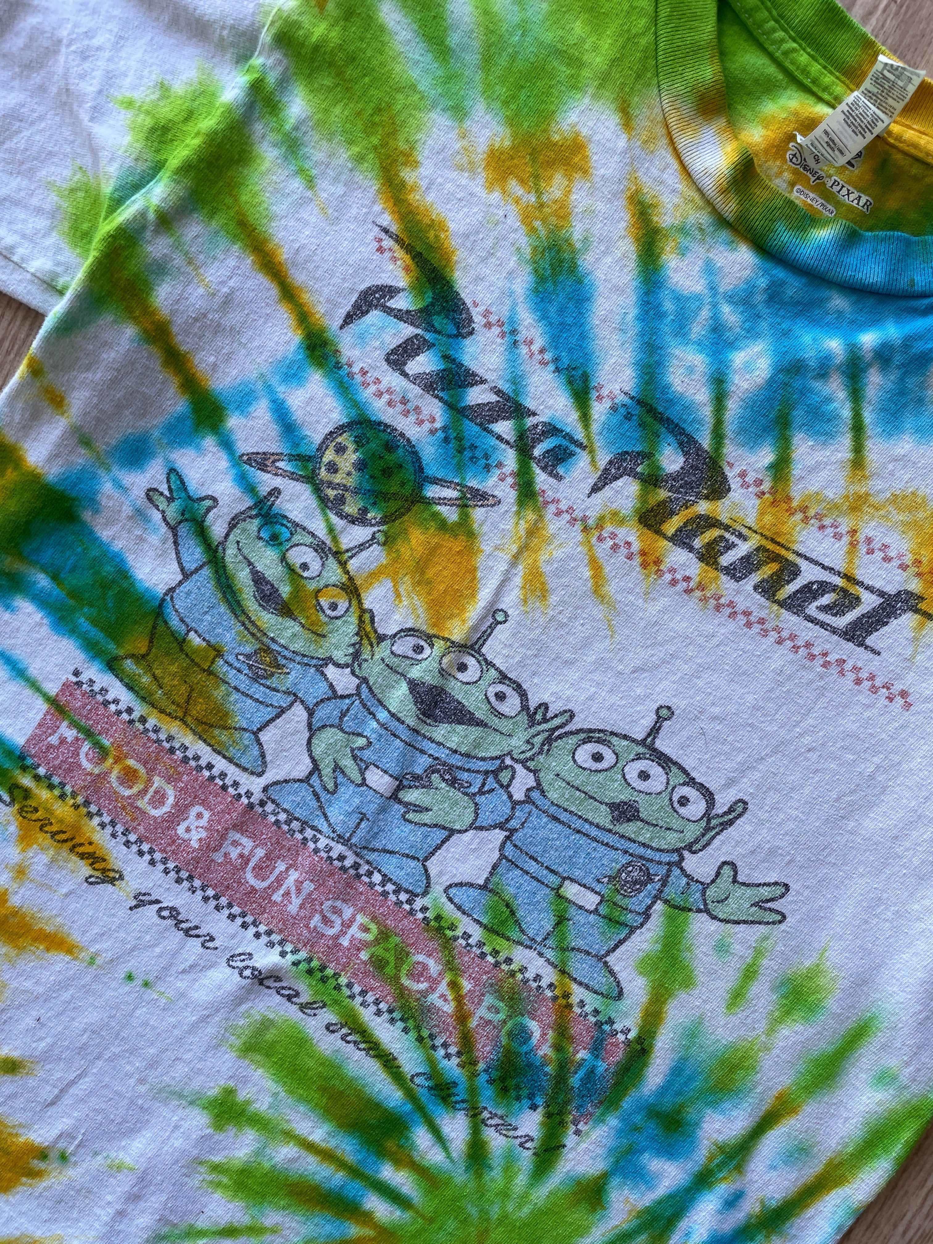 SMALL Men’s Toy Story Pizza Planet Handmade Tie Dye T-Shirt | One-Of-a-Kind Green, Blue, and Yellow Spiral Short Sleeve