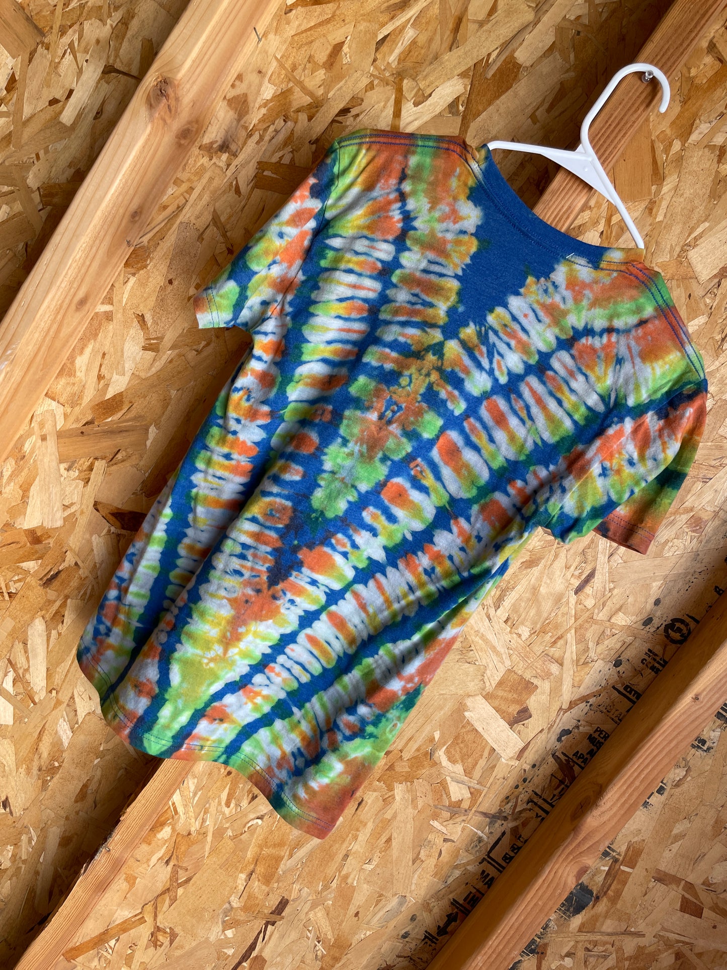 Small Women’s Outdoorsy Gorila Handmade Tie Dye T-Shirt | Blue, Green, and Orange V-Pleated Tie Dye Short Sleeve