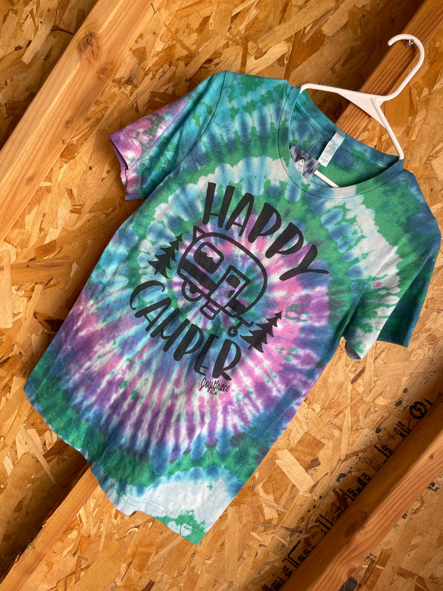 Medium women’s Happy Camper Handmade Tie Dye T-Shirt | Green, Pink, and Blue Spiral Tie Dye Short Sleeve