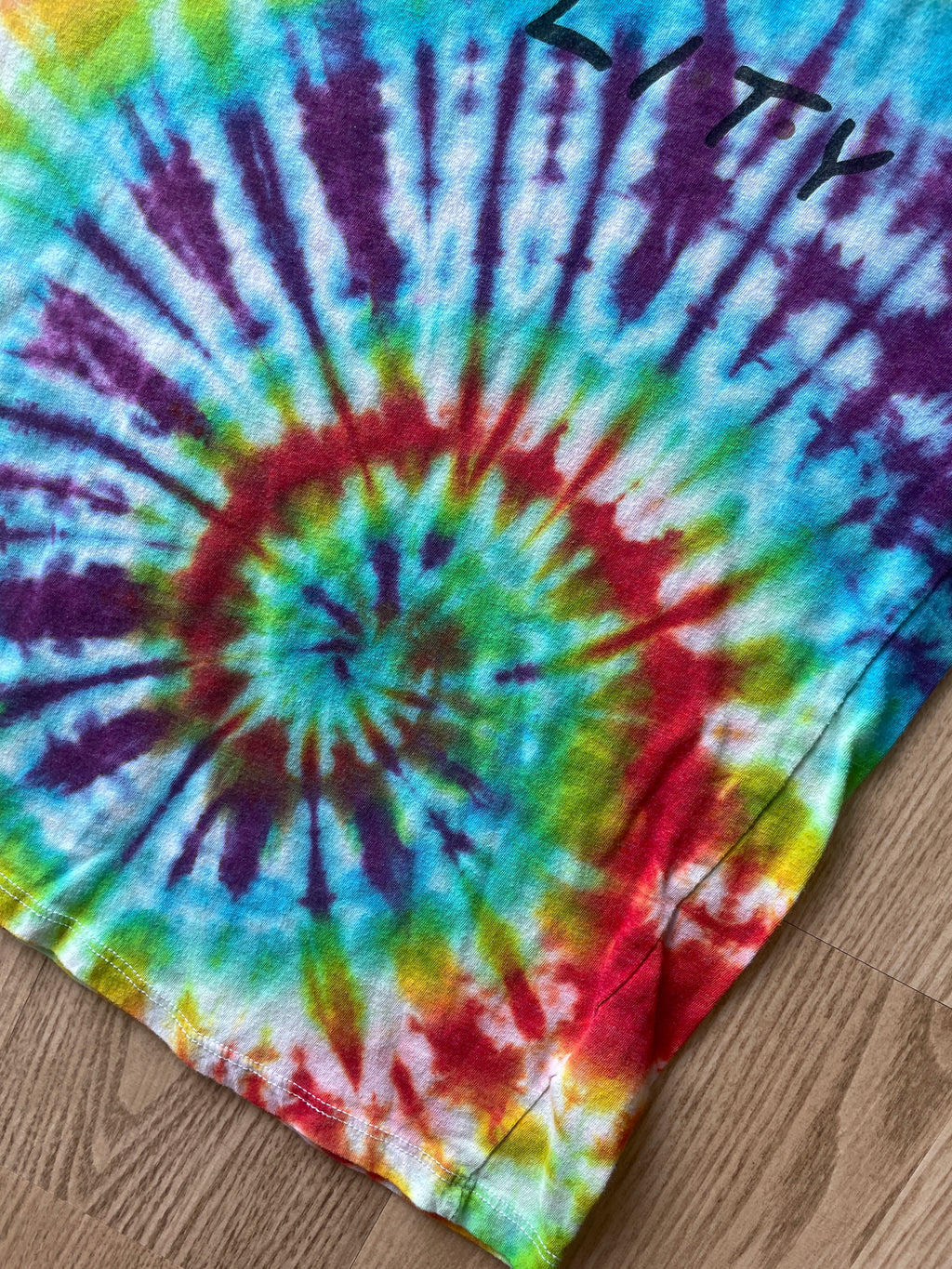MEDIUM Women's Equality PRIDE Handmade Tie Dye T-Shirt | One-Of-a-Kind Rainbow Spiral Short Sleeve