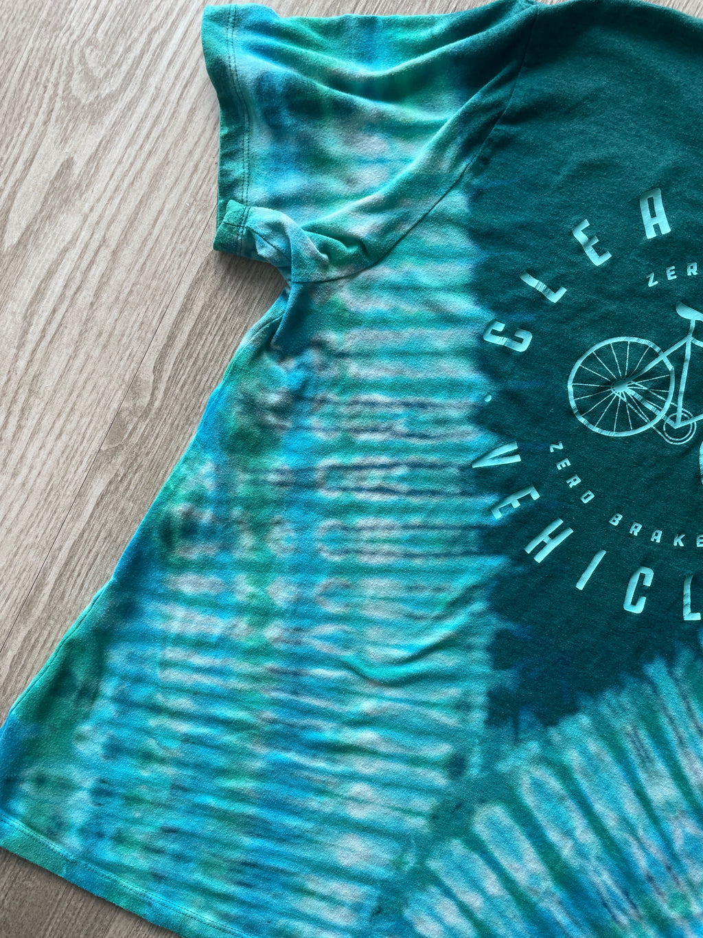 XL Men’s Bicycle Clean Energy Vehicle Handmade Reverse Tie Dye T-Shirt | One-Of-a-Kind Blue and Green Short Sleeve