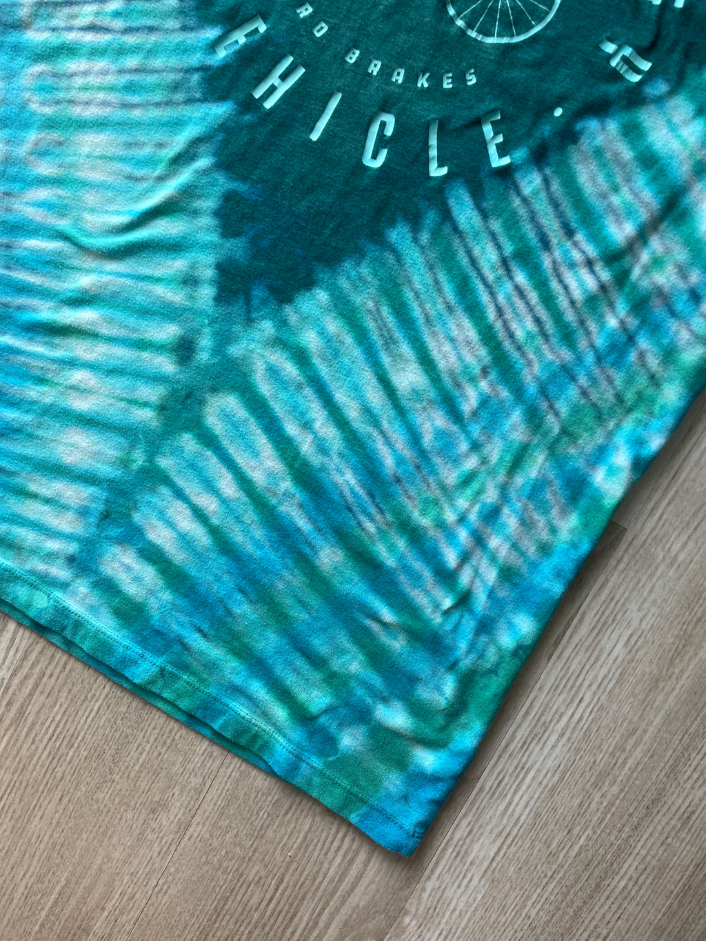 XL Men’s Bicycle Clean Energy Vehicle Handmade Reverse Tie Dye T-Shirt | One-Of-a-Kind Blue and Green Short Sleeve