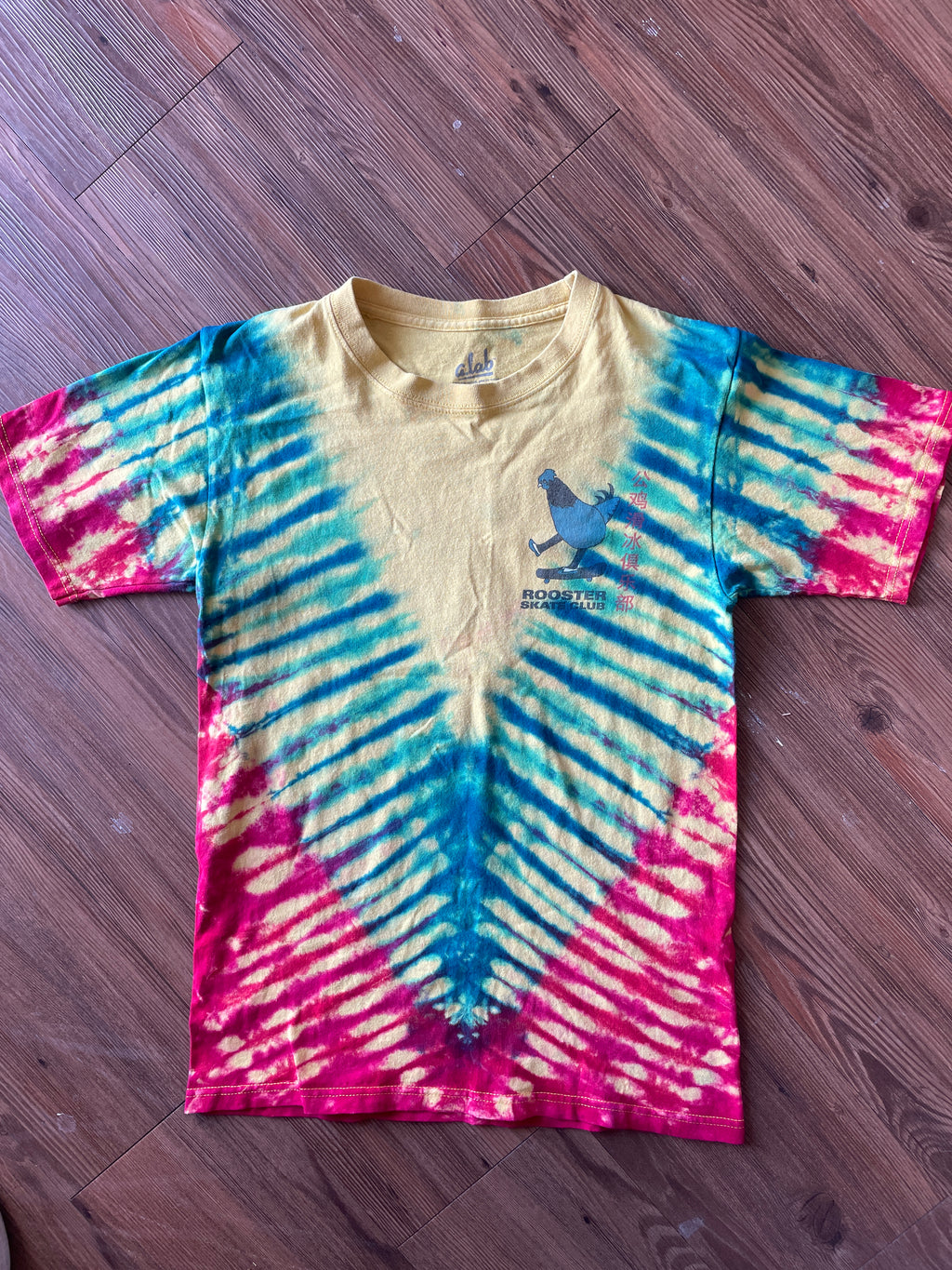 SMALL Men’s Rooster Skate Club Tie Dye T-Shirt | Yellow, Red, and Blue Skateboarding Tie Dye Short Sleeve