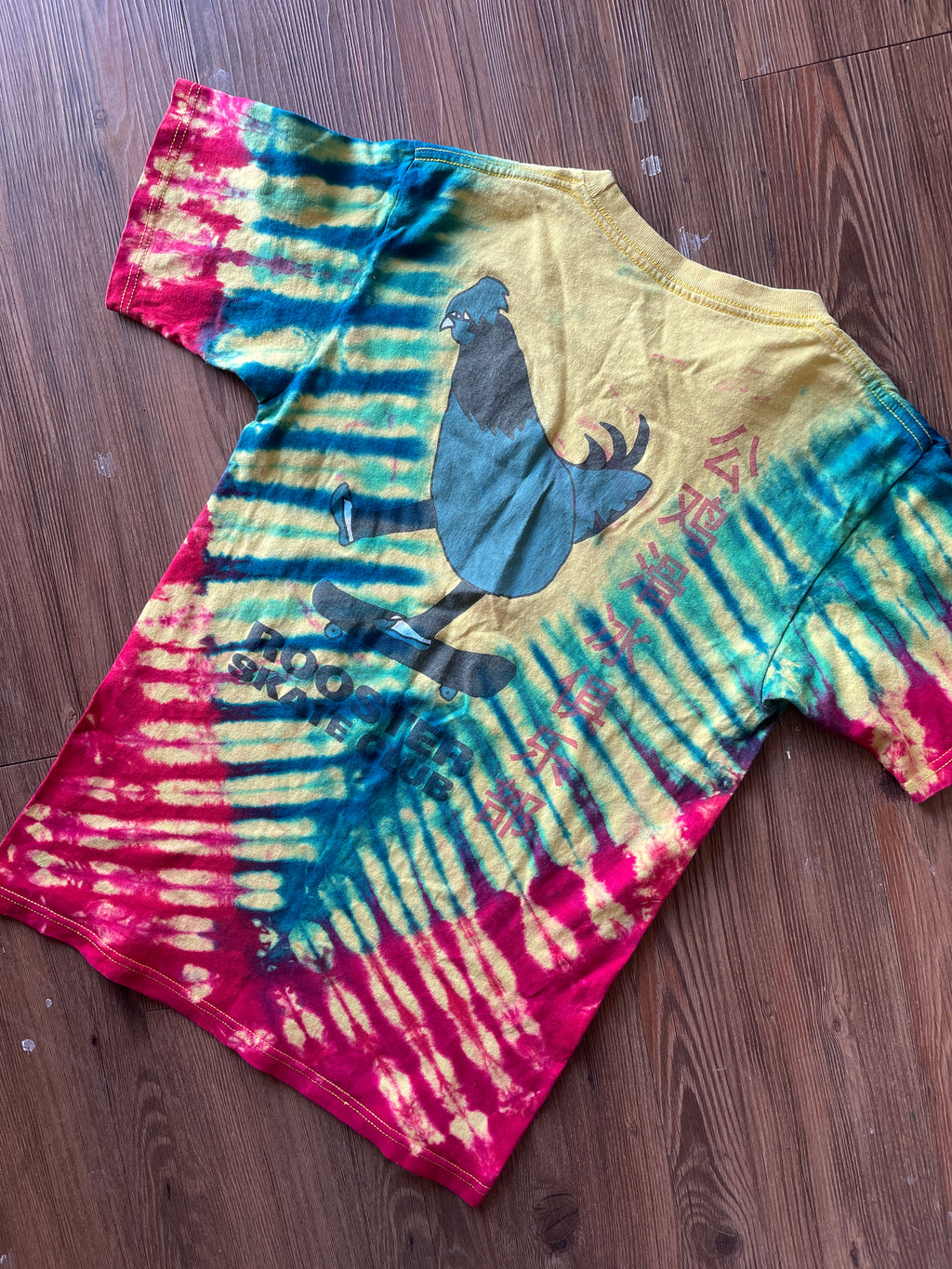 SMALL Men’s Rooster Skate Club Tie Dye T-Shirt | Yellow, Red, and Blue Skateboarding Tie Dye Short Sleeve