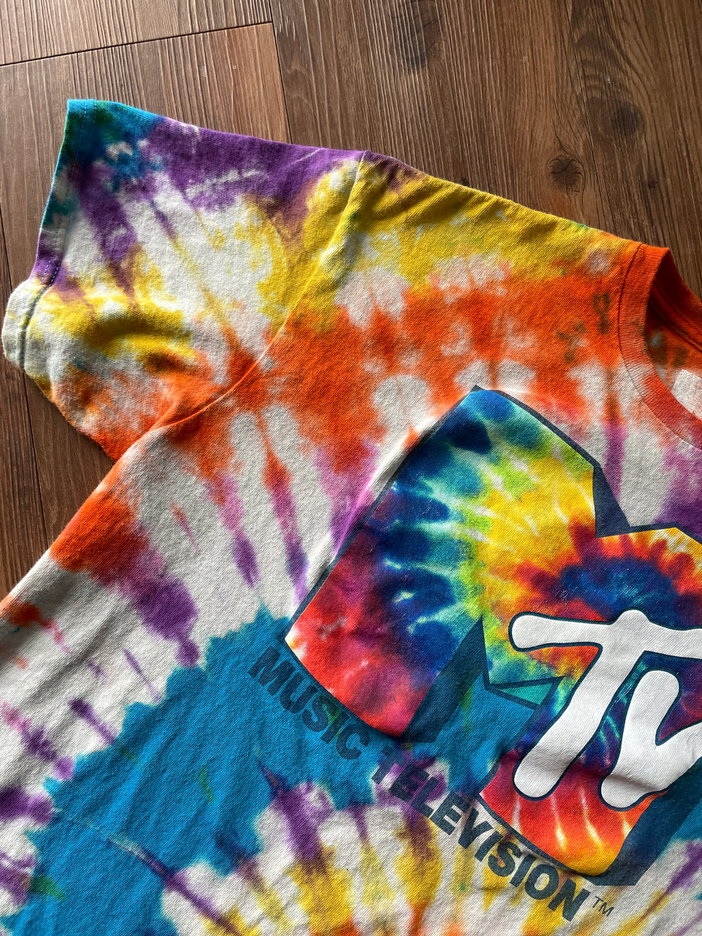 Medium Men’s MTV Handmade Tie Dye T-Shirt | Blue, Red, and Yellow Spiral Reverse Tie Dye Short Sleeve