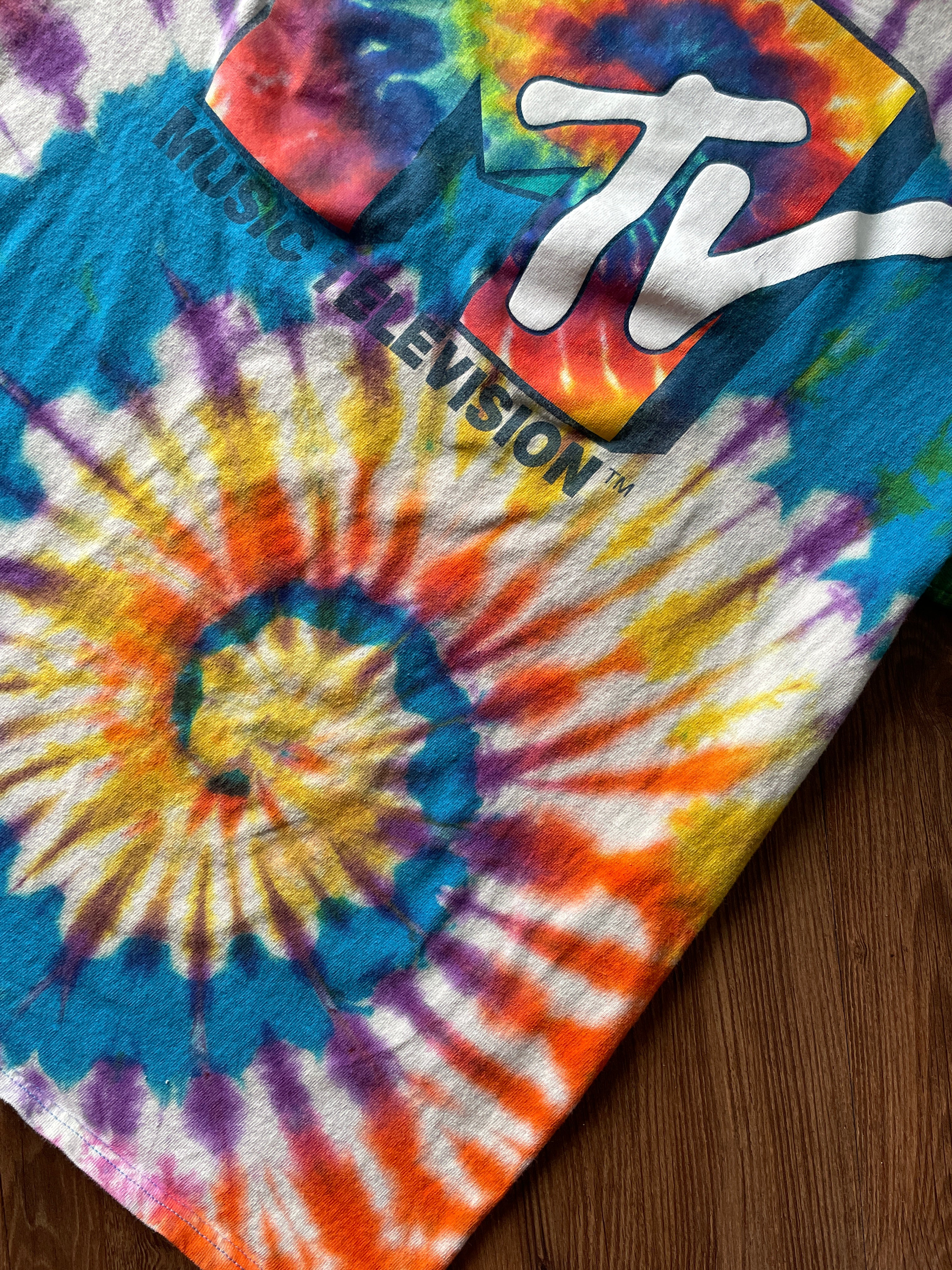 Medium Men’s MTV Handmade Tie Dye T-Shirt | Blue, Red, and Yellow Spiral Reverse Tie Dye Short Sleeve