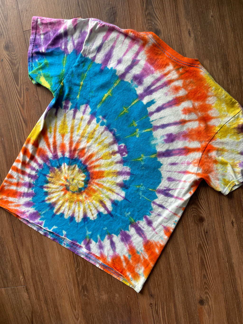 Medium Men’s MTV Handmade Tie Dye T-Shirt | Blue, Red, and Yellow Spiral Reverse Tie Dye Short Sleeve