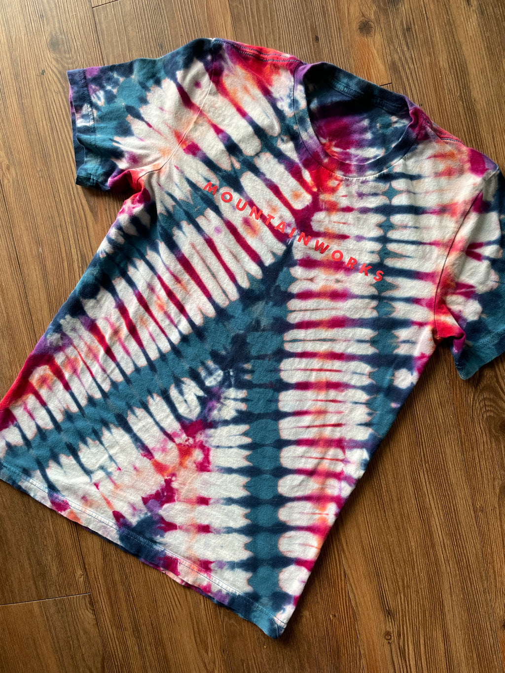 Medium Men’s Mountain Works (Provo, Utah) Handmade Tie Dye T-Shirt | Black, Red, and Orange V-Pleated Tie Dye Short Sleeve