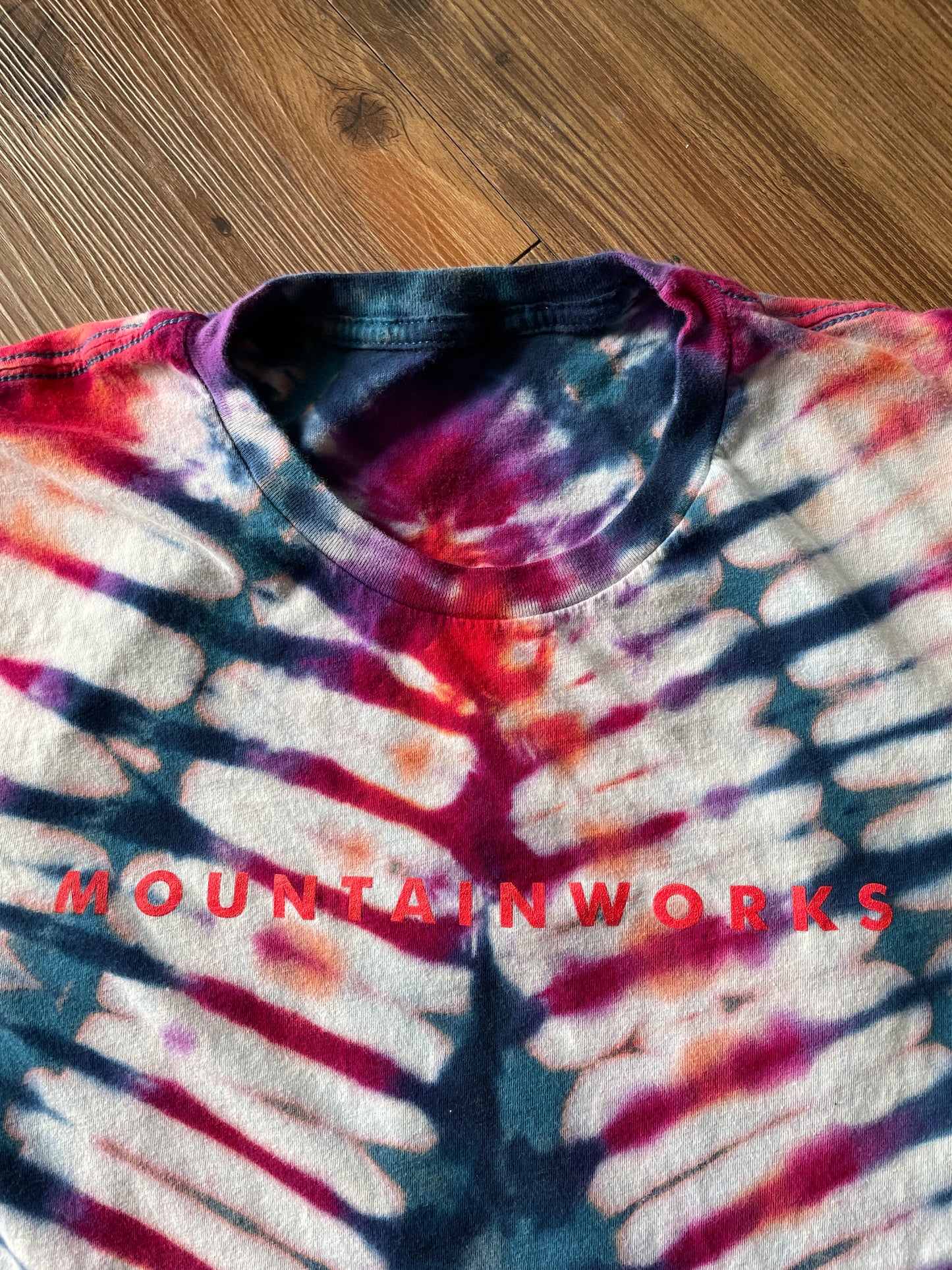 Medium Men’s Mountain Works (Provo, Utah) Handmade Tie Dye T-Shirt | Black, Red, and Orange V-Pleated Tie Dye Short Sleeve