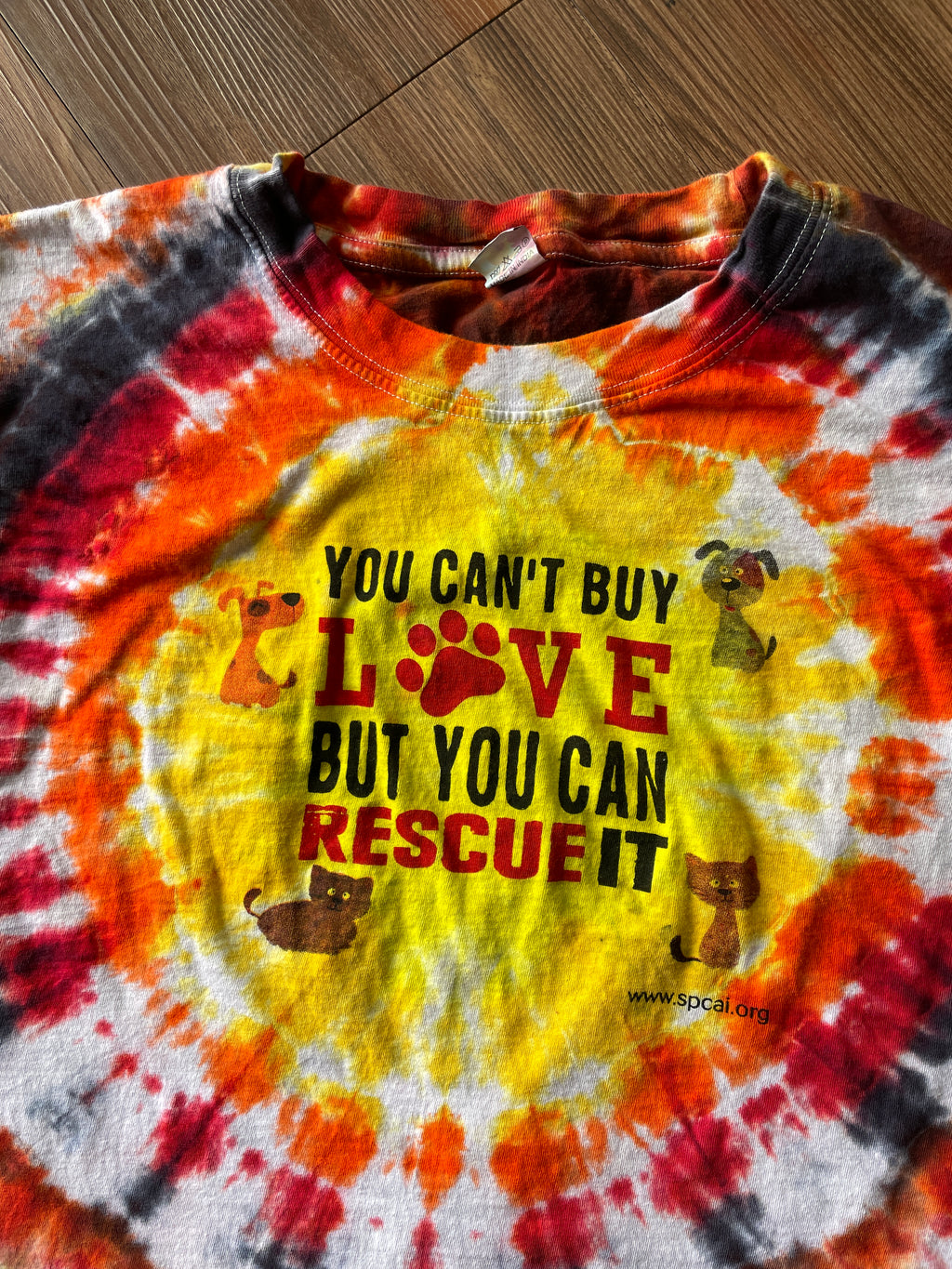 Large Men’s You Can't Buy Love But You Can Rescue It Handmade Tie Dye T-Shirt | Red, Orange, and Yellow Crumpled Tie Dye Short Sleeve