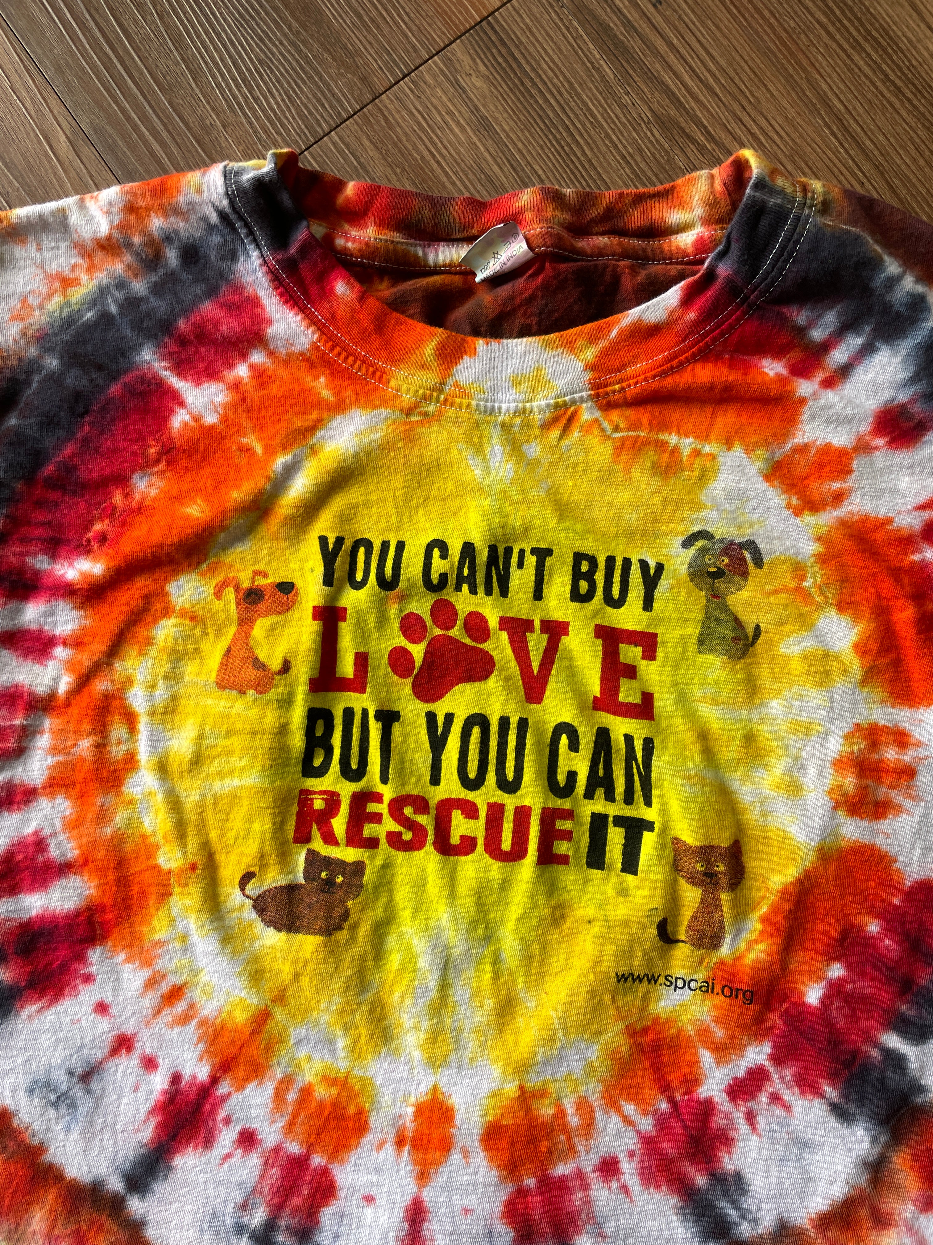 Large Men’s You Can't Buy Love But You Can Rescue It Handmade Tie Dye T-Shirt | Red, Orange, and Yellow Crumpled Tie Dye Short Sleeve