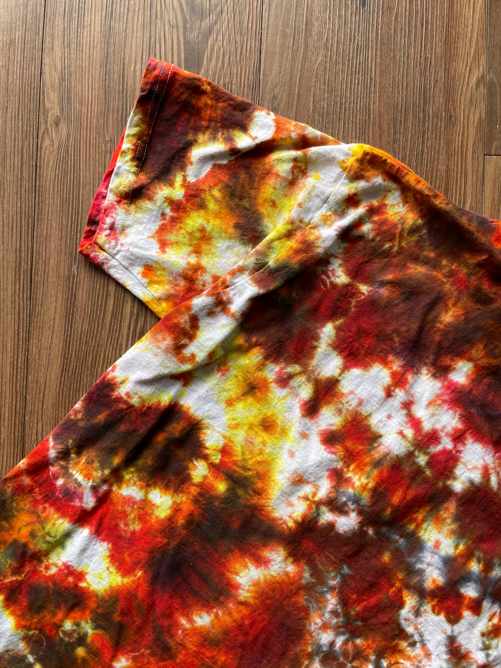 Large Men’s You Can't Buy Love But You Can Rescue It Handmade Tie Dye T-Shirt | Red, Orange, and Yellow Crumpled Tie Dye Short Sleeve