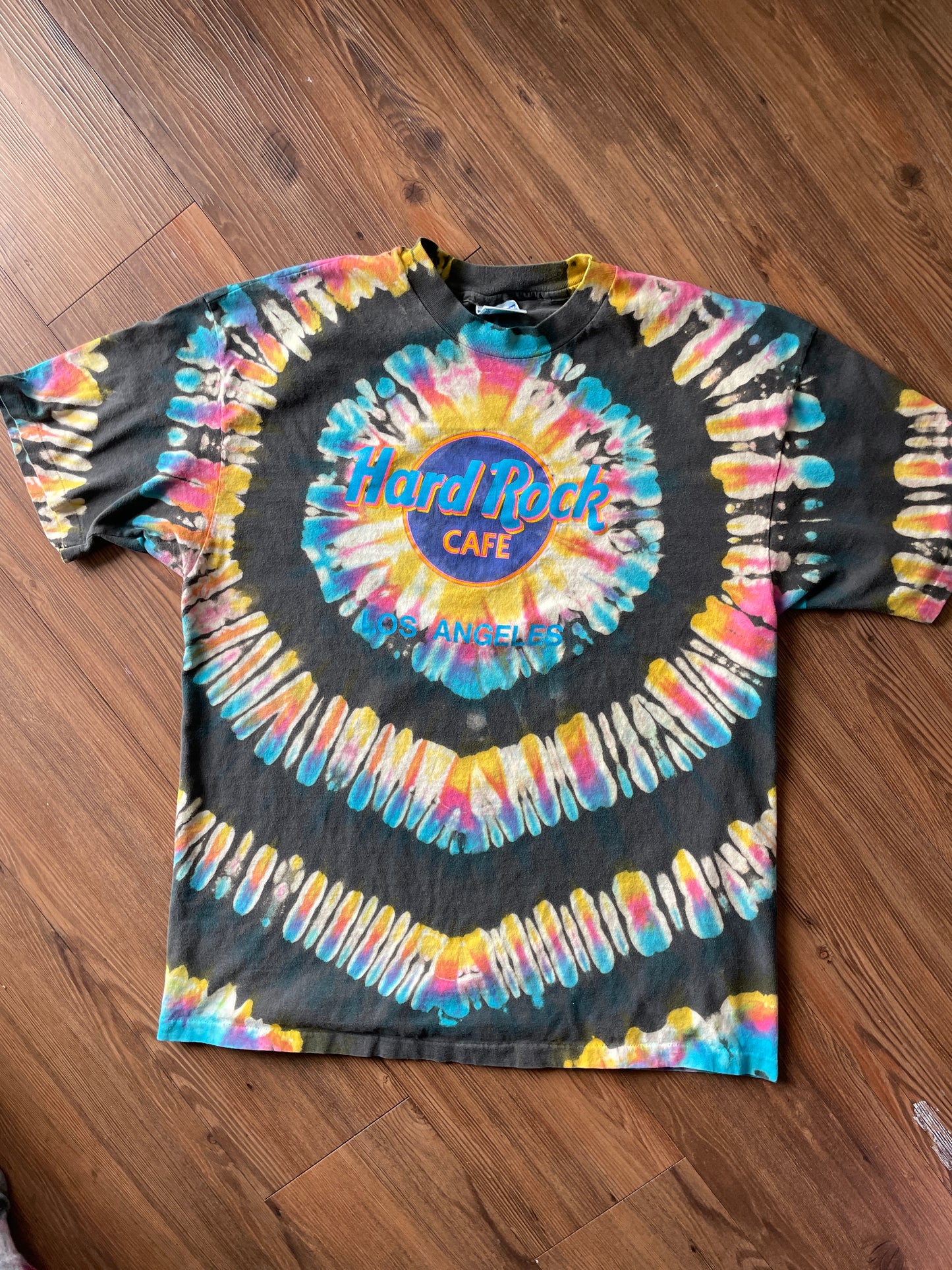 XL Men’s Hard Rock Cafe Los Angeles Handmade Reverse Tie Dye T-Shirt | Blue, Pink, and Yellow Pleated Tie Dye Short Sleeve