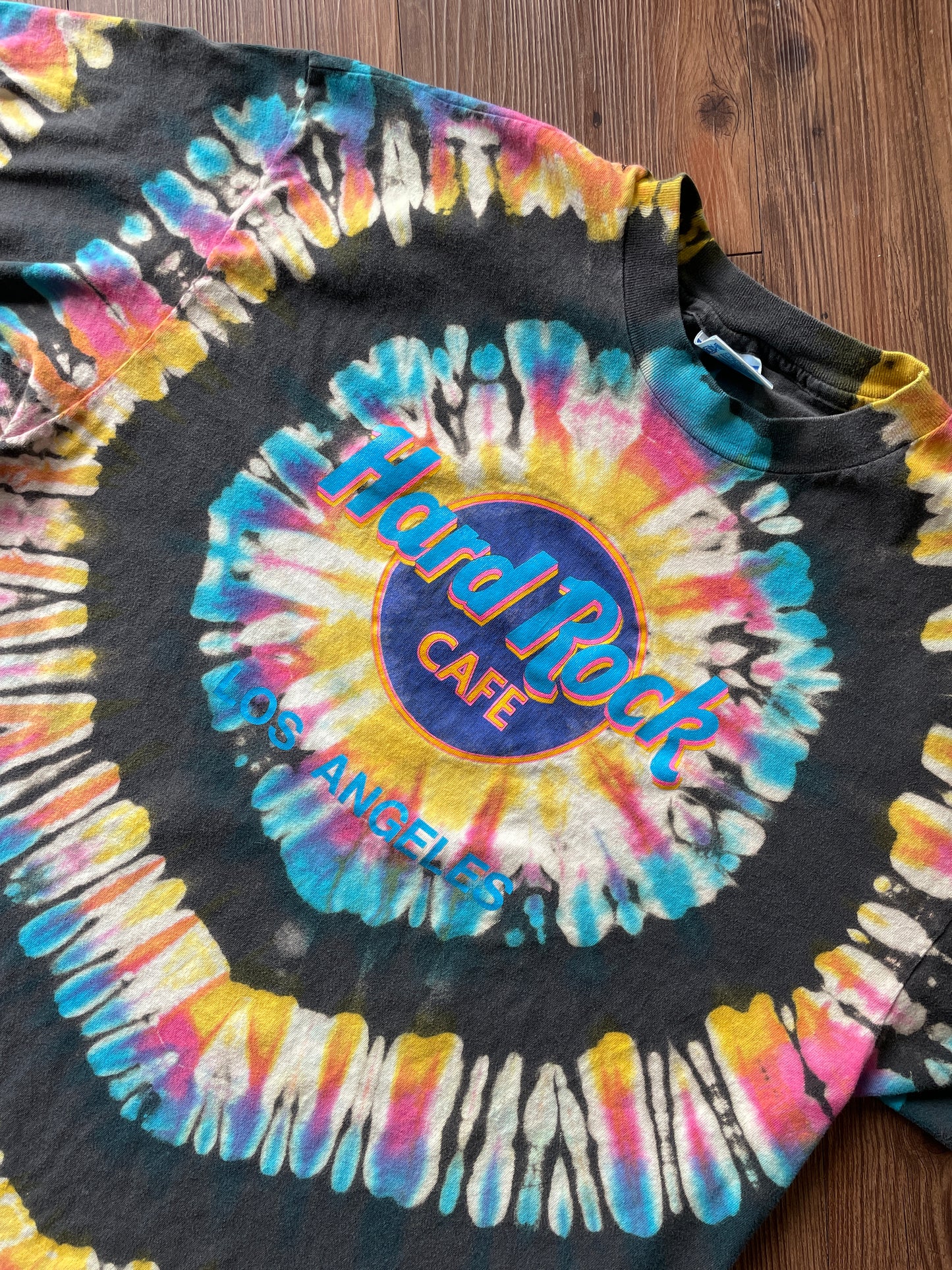 XL Men’s Hard Rock Cafe Los Angeles Handmade Reverse Tie Dye T-Shirt | Blue, Pink, and Yellow Pleated Tie Dye Short Sleeve
