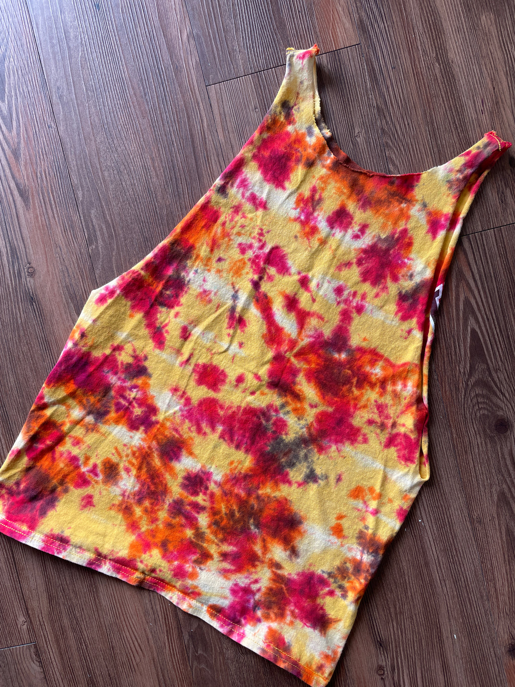 Small Men’s Wyoming Cowboys Tie Dye Cutoff Tank Top | Yellow and Red Tie Dye Sleeveless Shirt