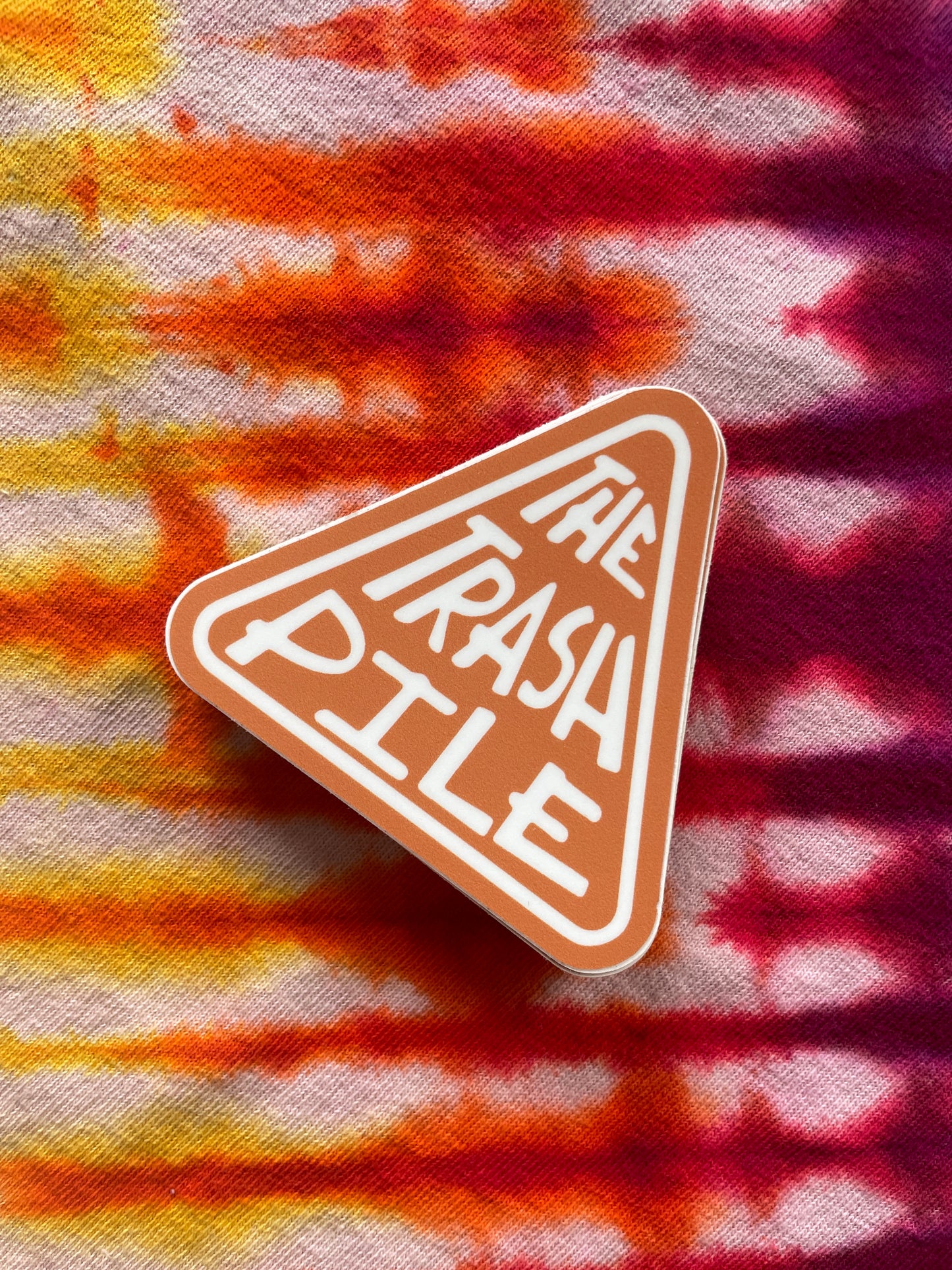 The Trash Pile Logo Sticker—Orange