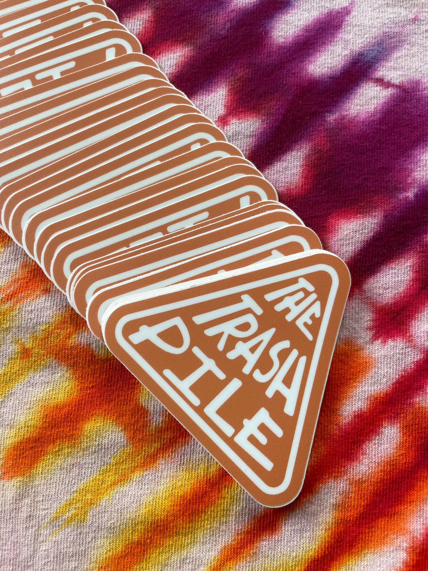 The Trash Pile Logo Sticker—Orange