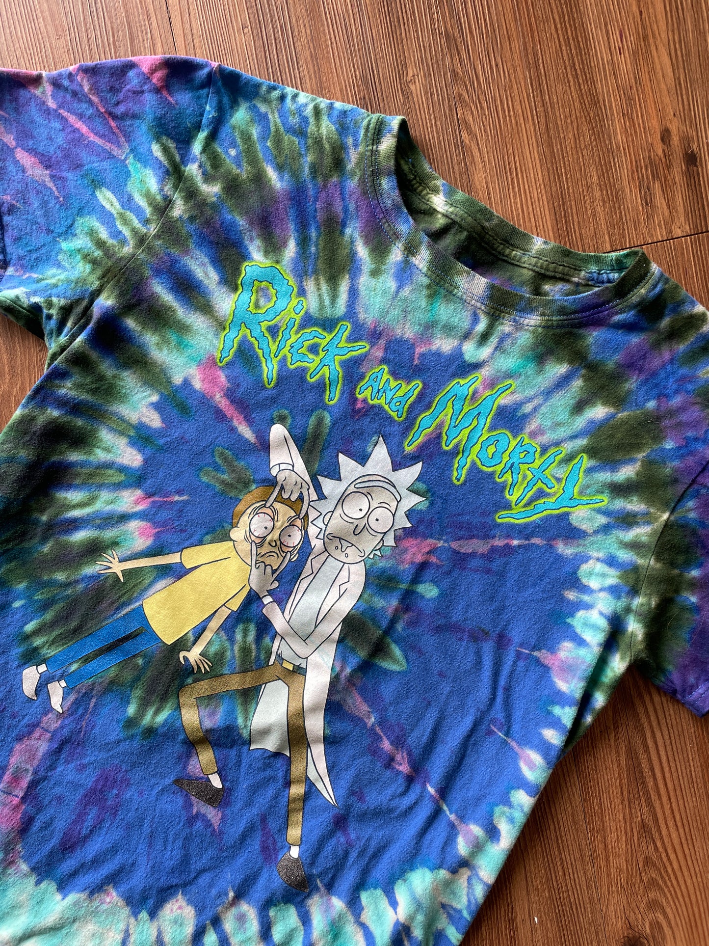 MEDIUM Men’s Rick and Morty Tie Dye T-Shirt | Blue and Green Open Your Eyes Morty Spiral Reverse Tie Dye Short Sleeve