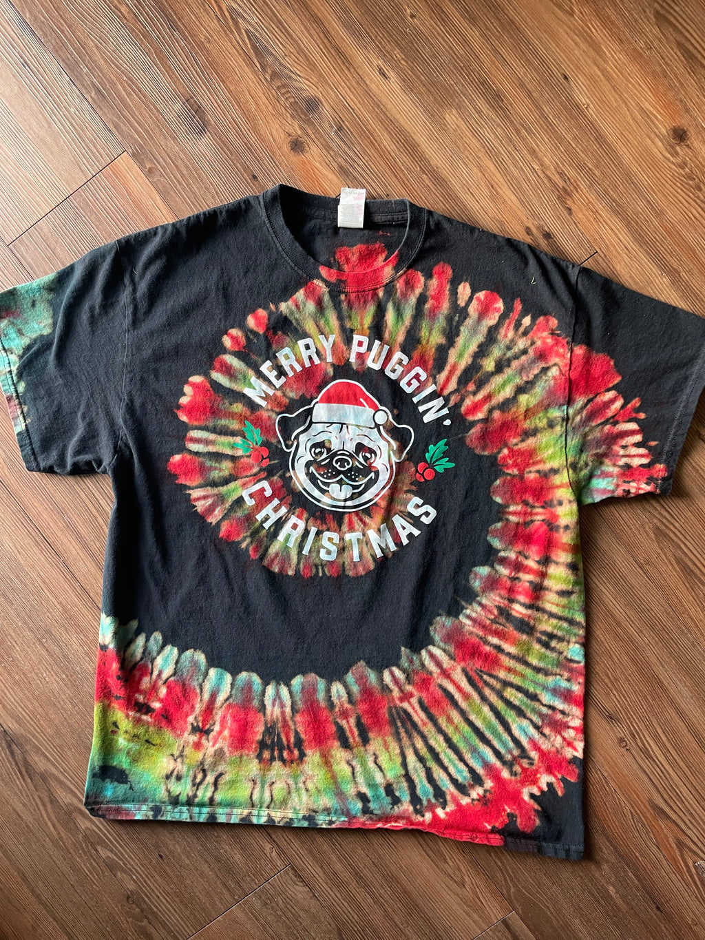 XL Men’s Merry Puggin Christmas Reverse Tie Dye T-Shirt | Black, Red, and Green Spiral Short Sleeve