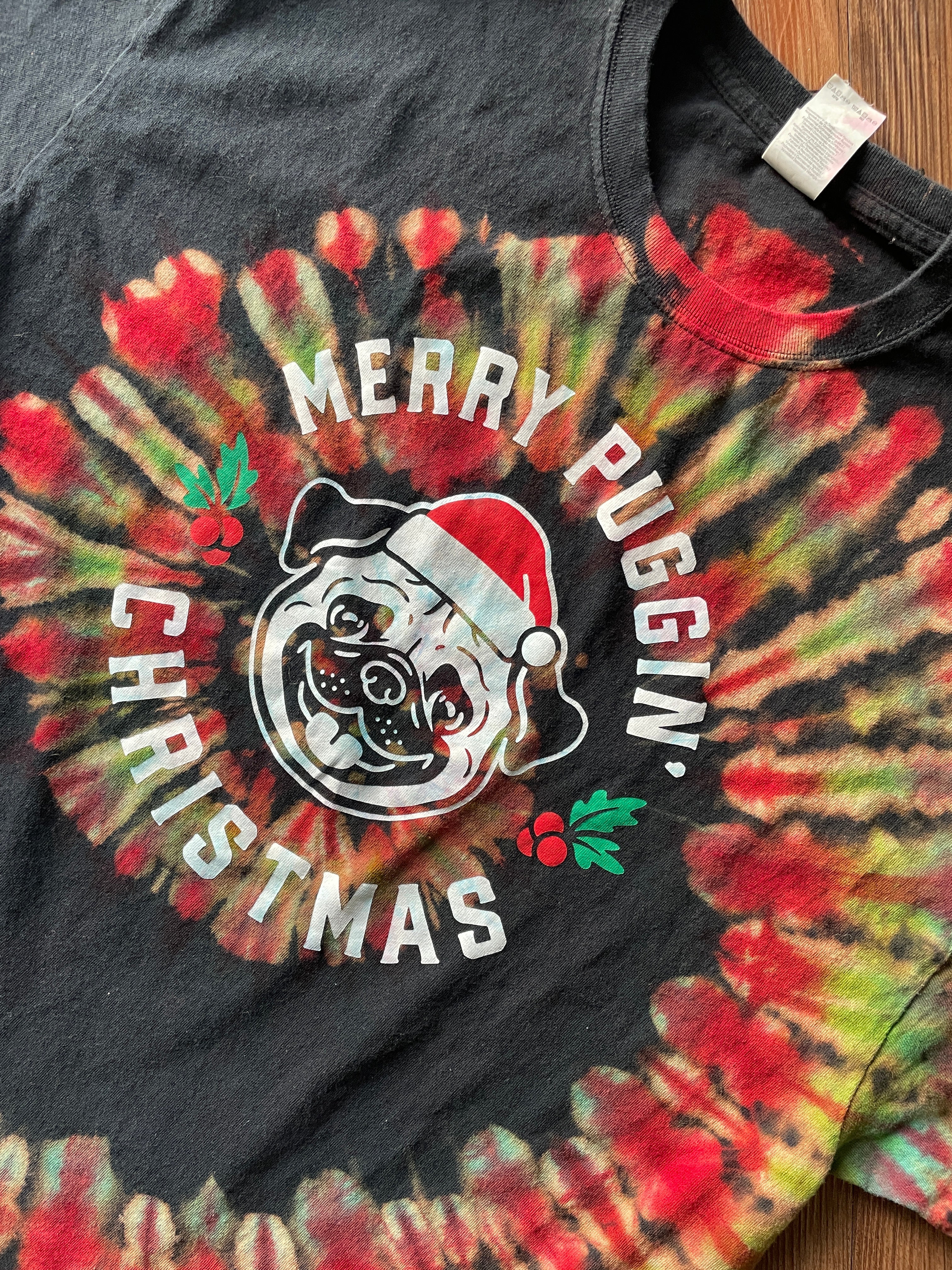 XL Men’s Merry Puggin Christmas Reverse Tie Dye T-Shirt | Black, Red, and Green Spiral Short Sleeve