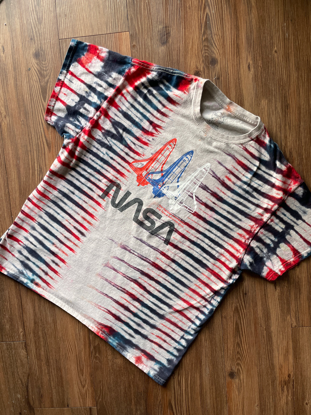 XL Men’s NASA Rockets Red, White, and Blue Pleated Tie Dye Short Sleeve T-Shirt