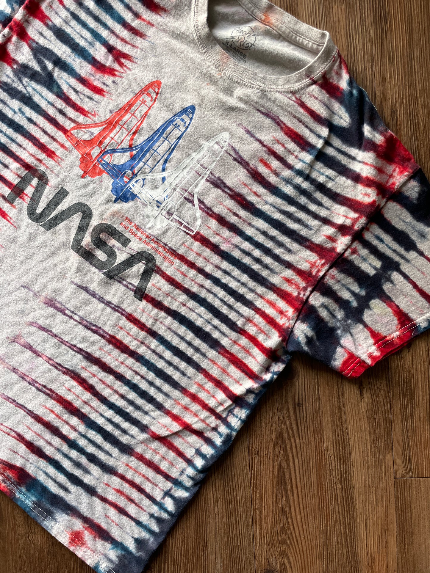 XL Men’s NASA Rockets Red, White, and Blue Pleated Tie Dye Short Sleeve T-Shirt