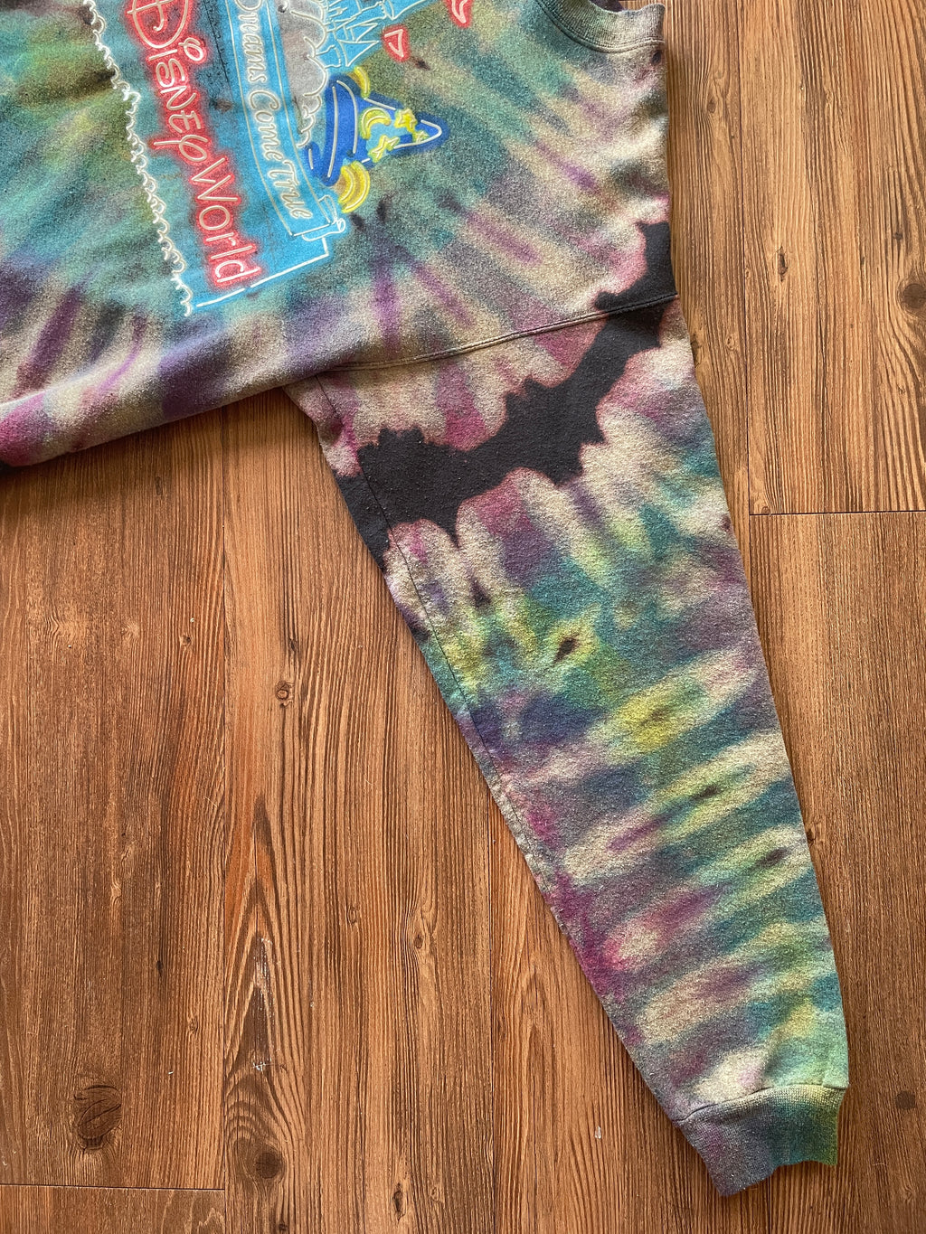 MEDIUM Men’s Walt Disney World Castle Reverse Tie Dye Sweatshirt | Black, Pink, and Purple Pleats Reverse Tie Dye Long Sleeve