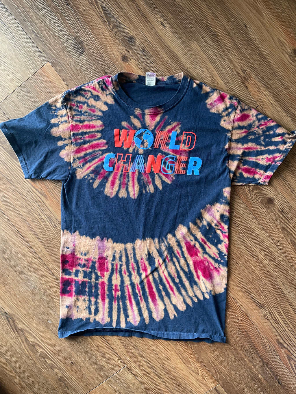 MEDIUM Men’s World Changer Reverse Tie Dye T-Shirt | Blue, Pink, and Red Spiral Tie Dye Short Sleeve Top