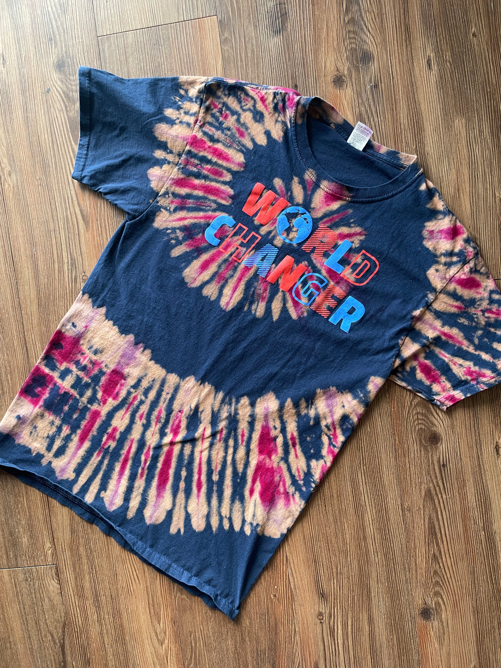 MEDIUM Men’s World Changer Reverse Tie Dye T-Shirt | Blue, Pink, and Red Spiral Tie Dye Short Sleeve Top