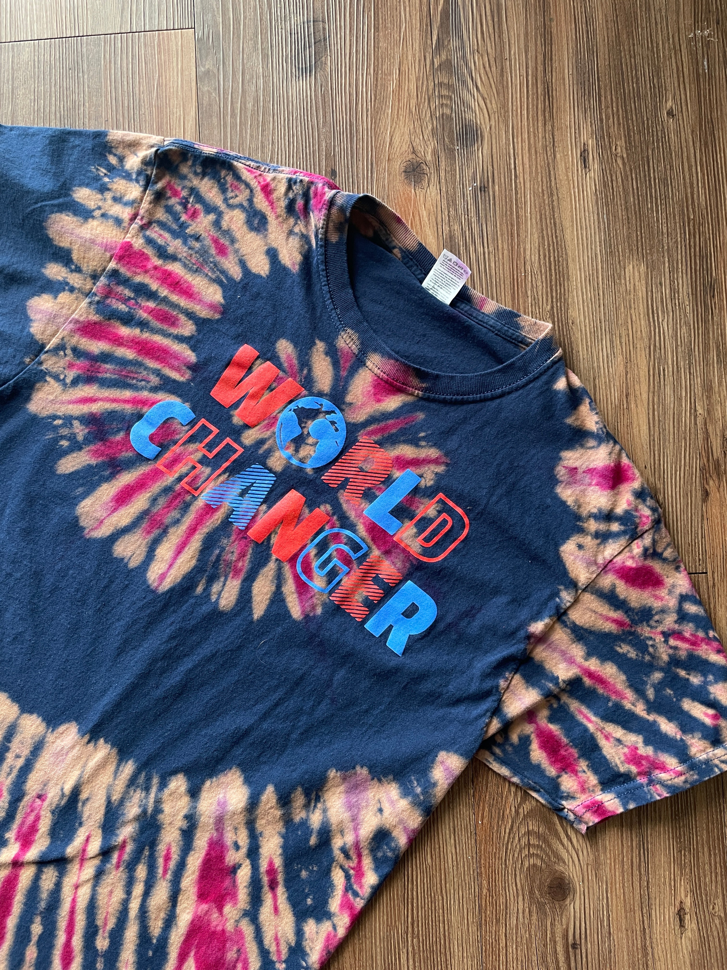MEDIUM Men’s World Changer Reverse Tie Dye T-Shirt | Blue, Pink, and Red Spiral Tie Dye Short Sleeve Top