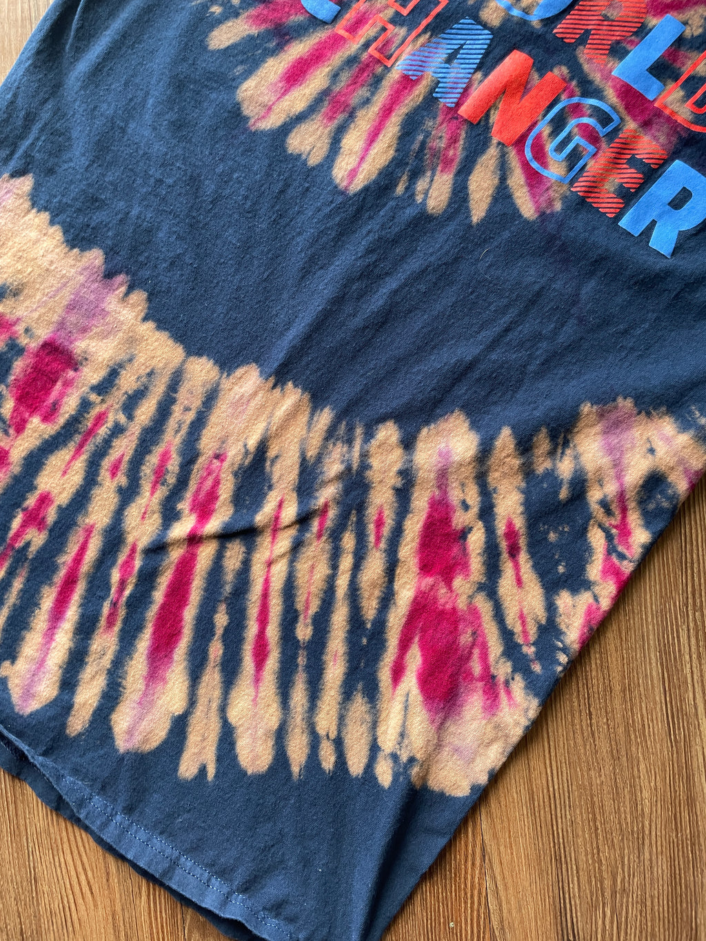 MEDIUM Men’s World Changer Reverse Tie Dye T-Shirt | Blue, Pink, and Red Spiral Tie Dye Short Sleeve Top
