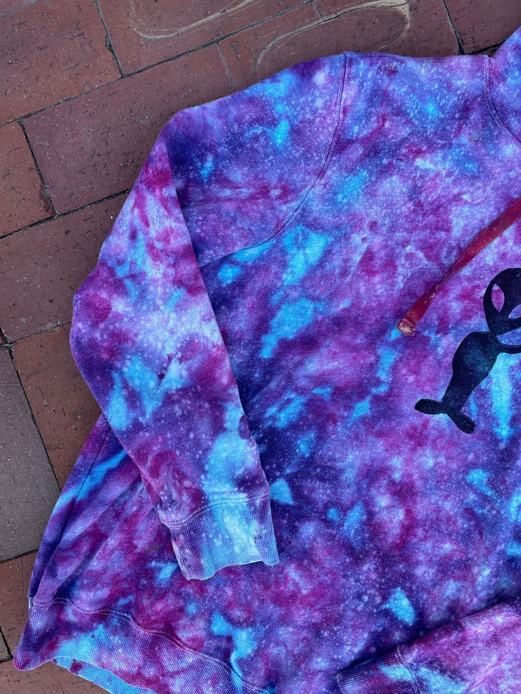Large Women's Hand-Printed Alien Reverse Tie Dye Hoodie | Handmade One-Of-a-Kind Upcycled Blue, Pink, and Purple Sweatshirt